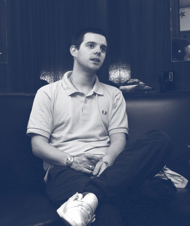 Mike Skinner wearing a Fred Perry Shirt